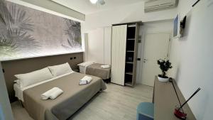 Camera Tripla con Balcone