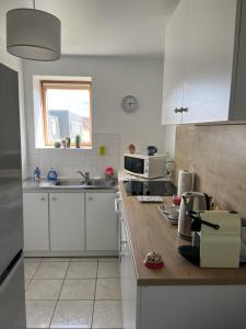 Appartements Les jardins de Magny. : photos des chambres