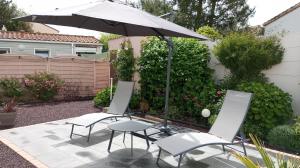 Maisons de vacances Jolie maison au calme - 300m de la plage - Terrasse - Barbecue : photos des chambres