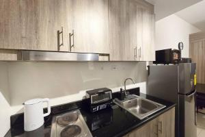 1BR Condotel with Balcony at FAME Residences #FM21