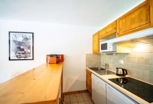 Appartements Bozel Rez de Chausse T1 : photos des chambres
