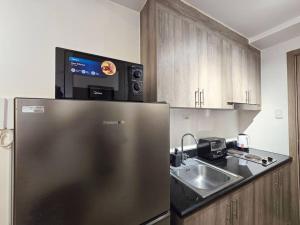 1BR Condotel with Balcony at FAME Residences #FM22