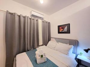 1BR Condotel with Balcony at FAME Residences #FM23