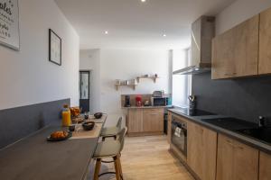 Appartements T4 Cosy Centre ville Chateau WIFI : photos des chambres