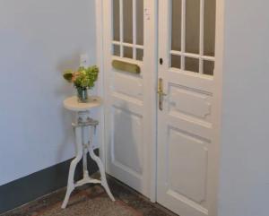 Charmantes Studio-Apartment im Shabby Chic Stil mit Balkon und Gartenblick - Ihr perfektes Zuhause in Graz