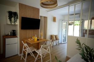 Appartements La paillotte - Studio terrasse proche tram : photos des chambres