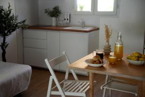 Appartements La paillotte - Studio terrasse proche tram : photos des chambres