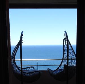 Appartements Appartement avec vue exceptionnelle sur mer : photos des chambres