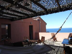 Appartements Appartement avec vue exceptionnelle sur mer : photos des chambres