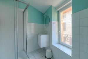 Appartements Le Triplex, 2 chambres, 2 salles de bain : photos des chambres