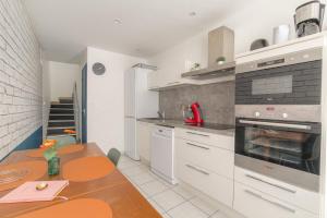 Appartements Le Triplex, 2 chambres, 2 salles de bain : photos des chambres