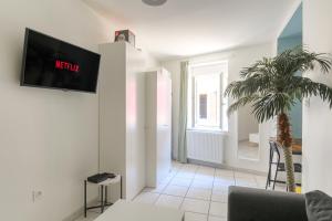 Appartements Le Triplex, 2 chambres, 2 salles de bain : photos des chambres