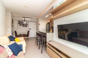 AP OCEAN UNLIMITED - Vista panorâmica da praia de Santos no Unlimited