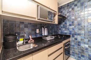 AP OCEAN UNLIMITED - Vista panorâmica da praia de Santos no Unlimited