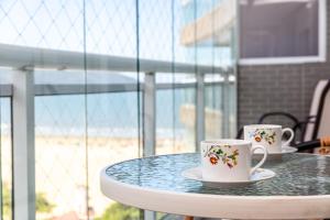 AP OCEAN UNLIMITED - Vista panorâmica da praia de Santos no Unlimited