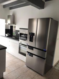 Maisons de vacances la maison d-en bas avec belle piscine : photos des chambres
