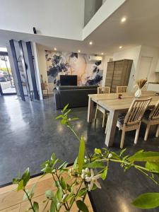 Appartements *le hangar du Paradis * : photos des chambres