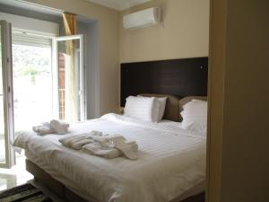 Kyknos De Luxe Suites & Rooms