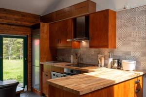 Heather Lodge with Sea and Mountain Views