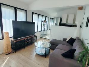 Maison de ville au calme avec jardin et parking