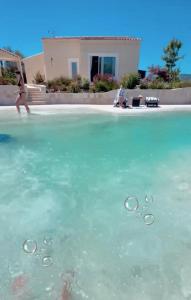 Appartements Duplex Oliveraie piscine au sel marin et parking : photos des chambres