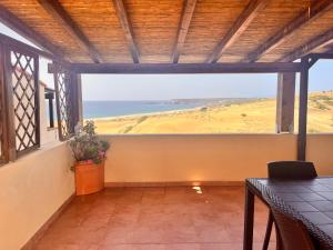 Torre dei Corsari mit Aussicht auf Meer und Dune
