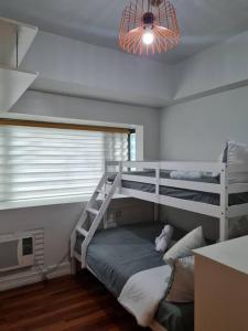 Big 2BR near Burgos Circle, Highstreet, St Lukes - B Parklane T1