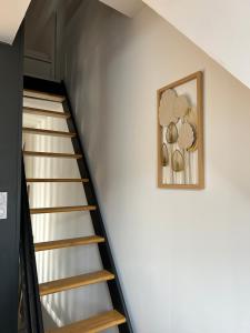 Appartements Le repos de la Meuse : photos des chambres