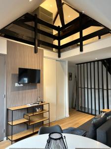 Appartements Le repos de la Meuse : photos des chambres