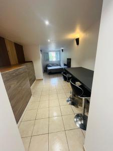 Appartements Charmant studio : photos des chambres