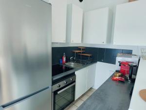 Appartements Maison de ville au calme avec jardin et parking : photos des chambres