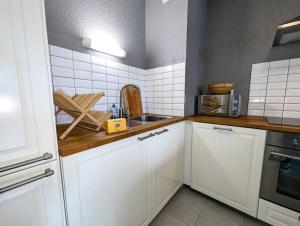 Appartements Reflet YourHostHelper : photos des chambres