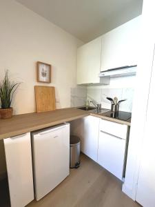 Appartements Le nid douillet de Jade : photos des chambres