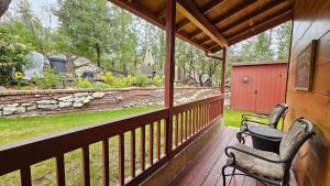 Knotty Pine Cabin with Artisan Stone Patio - Walk to Bass Lake