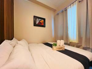 1BR Condotel with Balcony at FAME Residences #FM26