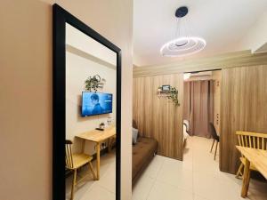 1BR Condotel with Balcony at FAME Residences #FM27