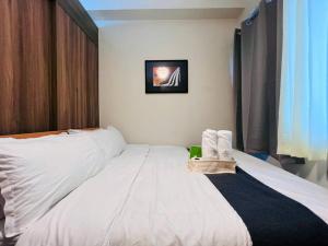 1BR Condotel with Balcony at FAME Residences #FM27