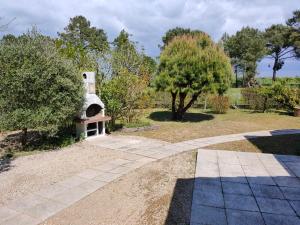 Maisons de vacances Villa au Calme avec Jardin, Proche Plage, Equipee pour Familles - FR-1-194-285 : photos des chambres