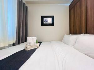 1BR Condotel with Balcony at FAME Residences #FM28