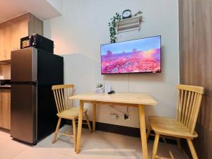 1BR Condotel with Balcony at FAME Residences #FM28