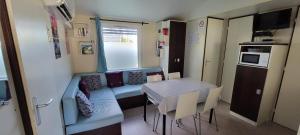 Campings Mobilhome 6 personnes 32m2 : photos des chambres