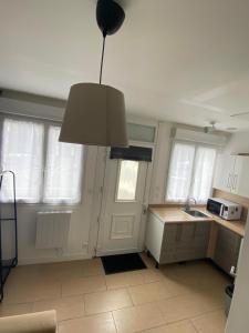 Appartements studio Vercingetorix - Proche Paris & Disney : photos des chambres