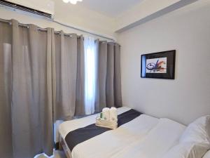 1BR Condotel with Balcony at FAME Residences #FM30