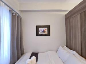 1BR Condotel with Balcony at FAME Residences #FM30