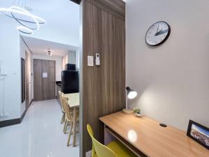 1BR Condotel with Balcony at FAME Residences #FM31