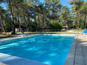 Maisons de vacances Maison familiale en bordure du lac - O bois flotte : photos des chambres