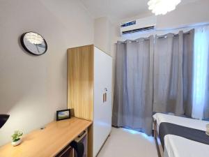 1BR Condotel with Balcony at FAME Residences #FM32