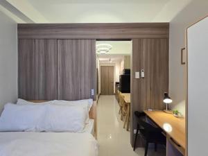 1BR Condotel with Balcony at FAME Residences #FM33