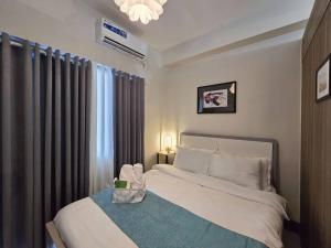 1BR Condotel with Balcony at FAME Residences #FM34