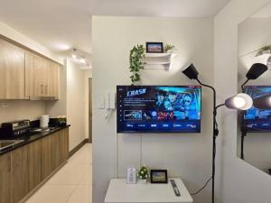 1BR Condotel with Balcony at FAME Residences #FM35